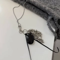 Long beaded silver necklace featuring a black oval gemstone pendant and metallic tassels - Bottle and Grape Cluster Necklace / Approx 90cm / Black