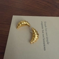 Golden croissant-shaped stud earrings with delicate pleated texture and silver pins - 925 Silver Earring Post / Gold Croissant Stud Earrings
