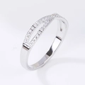 Elegant twisted silver ring with double row of pavé set cubic zirconia in cross design - US 6 / Silver