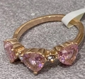 Rose gold heart ring featuring three pink gemstones and white cubic zirconia accents - US 7 / Pink Zirconia Rose Gold Ring