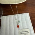 Artisan bird and gemstone pendant necklace with carnelian, pearl, and turquoise beads - Magpie Red Agate Necklace