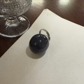 Minimalist ring featuring a large glossy black resin dome on an adjustable silver band - Dark Gray Ring
