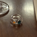 Chic transparent resin ring featuring emerald green and orange rectangular gemstones - Clear Ring with Multicolor Zirconia