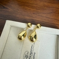 Boucles d'oreilles gouttes dorées pour femmes avec fini miroir poli et design de puce - Boucles d'Oreilles Goutte d'Eau Dorées / Or