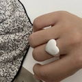 Minimalist silver heart ring with brushed matte finish shown on index finger - Heart Silver Brushed (4609)