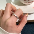 Minimalist silver S925 heart ring with continuous heart pattern on female finger - Silver Single Layer Multi-Heart (4609)