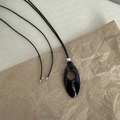 Minimalist black oval cutout pendant necklace with sleek cord and silver metal accents - Glossy Black (Black Cord)