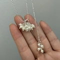 Elegant silver pearl cluster necklace with adjustable chain and dangling tassel charms - Pearl Style
