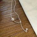 Adjustable silver chain necklace with a large polished metal bead and tassel charms - Plated Round Ball Adjustable Style / Silver