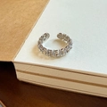 Adjustable silver chain texture ring with minimalist hollow design on a book cover - Silver Narrow Band