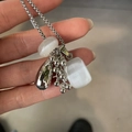 Silver grape cluster necklace with natural stones held in hand for detail view - Long Fixed Style / White Cat's Eye With Water Drop Grapes