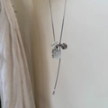 Silver titanium necklace with blue square stone, white gem and spotted marble bead - White Cat's Eye Drawstring Style