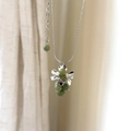 Silver grape cluster pendant necklace with light green stones and floral petals - Green Grape Cluster Necklace