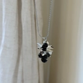 Artistic silver necklace with black stone grape cluster and metallic floral petals - Black Agate Cluster Necklace