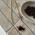 Handmade woven cord necklace with a matte dark brown whale pendant and gold bead detail - Dark Red Fish with Beige Cord