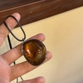 Adjustable irregular amber resin pendant necklace with silver base and black cord - Coffee With Black Cord