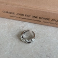 Adjustable silver-plated hollow geometric ring with a polished twisted rope design - Thick Wave Flower Ring