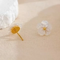Close-up of white shell flower earrings with golden core and stud pin detail - Shell Flower Hoop Earrings - Gold