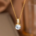 Elegant gold necklace with a round sparkling zircon pendant and three-stone pavé detail - Rhinestone Single Diamond Necklace / Gold