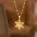 Exquisite gold snowflake necklace featuring micro-set zircons and a central moonstone pendant - Aurora Snowflake Style (9209) / Gold