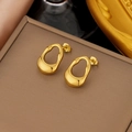 Elegante goldene Lava-Ohrringe mit unregelmäßigem Flüssigmetall-Design auf Schmuckkästchen - Gold Irregulärer Wassertropfen Stil (EHG183)
