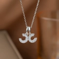 Detailansicht der silbernen Kette mit Kristall-Pavé und Twin-C Anhänger - Silber Vollstrass Doppel C Stil (9200)