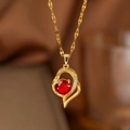 Gold necklace featuring asymmetric heart pendant with vibrant red zircon and white stones - Red Zircon Heart (9142) / Gold