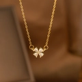 Detailed close-up of golden laurel necklace with pear-cut zirconia clover pendant - Four-Leaf Clover Style (9166)
