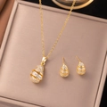 Parure dorée en forme de goutte avec micro-zirconium comprenant collier et boucles - Style Goutte d'eau Évidé / Or