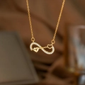 Elegant gold infinity heart necklace with sparkling white zircons and ECG line detail - Heartbeat Figure Eight (9244)