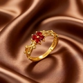Adjustable golden flower ring with red heart stones and vine vine details on silk background - Red