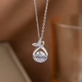 Elegant silver fish tail pendant necklace with brilliant Moissanite and micro-pave diamonds - Silver