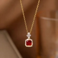 Luxurious gold necklace featuring a square red gemstone pendant with diamond halo accent - Ruby Red Style(9281)
