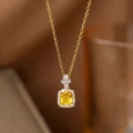 Detailed view of square-cut yellow gemstone pendant with diamond halo on gold chain - Yellow Gemstone Style(9283)