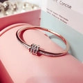 Elegant rose gold titanium bracelet with triple interlocking pave zircon rings - Lucky Bead Sliding Ring Style / Rose Gold