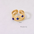 Detail of 9mm wide multi-layer gold ring with four blue natural stones and bead texture - Lapis Lazuli