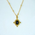 Detail of vintage 14k gold plated satellite chain with an oval black faceted gemstone pendant - Necklace / Black Agate Necklace