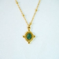 Macro view of 14k gold beaded necklace with vintage green gemstone pendant - Necklace / African Jade Necklace