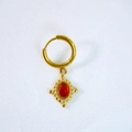 Detail of vintage gold-plated earrings with oval red gemstone and baroque textured bezel - Red Agate Earrings