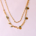 Detail of gold double-layer necklace with paperclip chain, marble beads and metal coins - African Pine Layered Chain