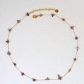 Detailed macro view of handmade gold chain necklace with purple stones and lobster clasp - Purple Natural Stone (2)