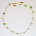 Close-up of gold chain with green beads and S.steel hallmark on the lobster clasp - Mint Green White Stone (9)