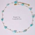 Detailed view of ocean-style necklace with blue stones, pearls, and gold extension chain - Amazonite Beaded Necklace