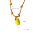 Detail of colorful braided cord necklace with a yellow lemon pendant and sizing dimensions - Yellow Lemon Pendant (XB2506011)