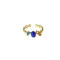 Adjustable stainless steel ring with blue and orange stones in a hollow floral design - Lapis Lazuli