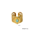 Golden wide open ring with oval blue natural stone and detailed hollowed out side bands - Amazonite