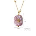 Baroque purple pearl pendant necklace with gold starburst and size measurement details - Baroque Pearl Style (XBX25092708)
