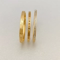 Set di tre bracciali in acciaio al titanio dorato con numeri romani e incisioni - Oro