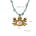 Collier artisanal en corde tressée avec pendentif crabe doré orné d'une perle blanche - Pendentif Crabe en Perle (XB2506004)