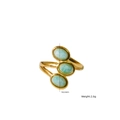 Gold titanium steel ring featuring three oval light blue stones in a bypass style - Amazonite